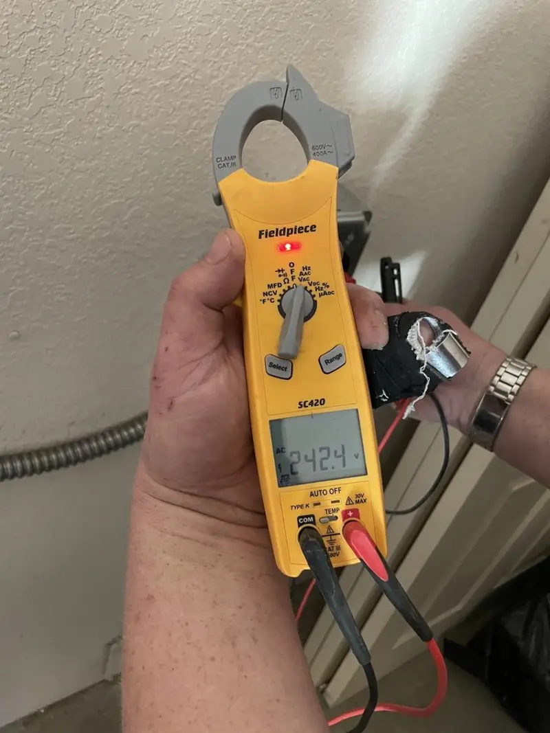 Voltage testing with clamp meter during Generator Installation in Richland Hills